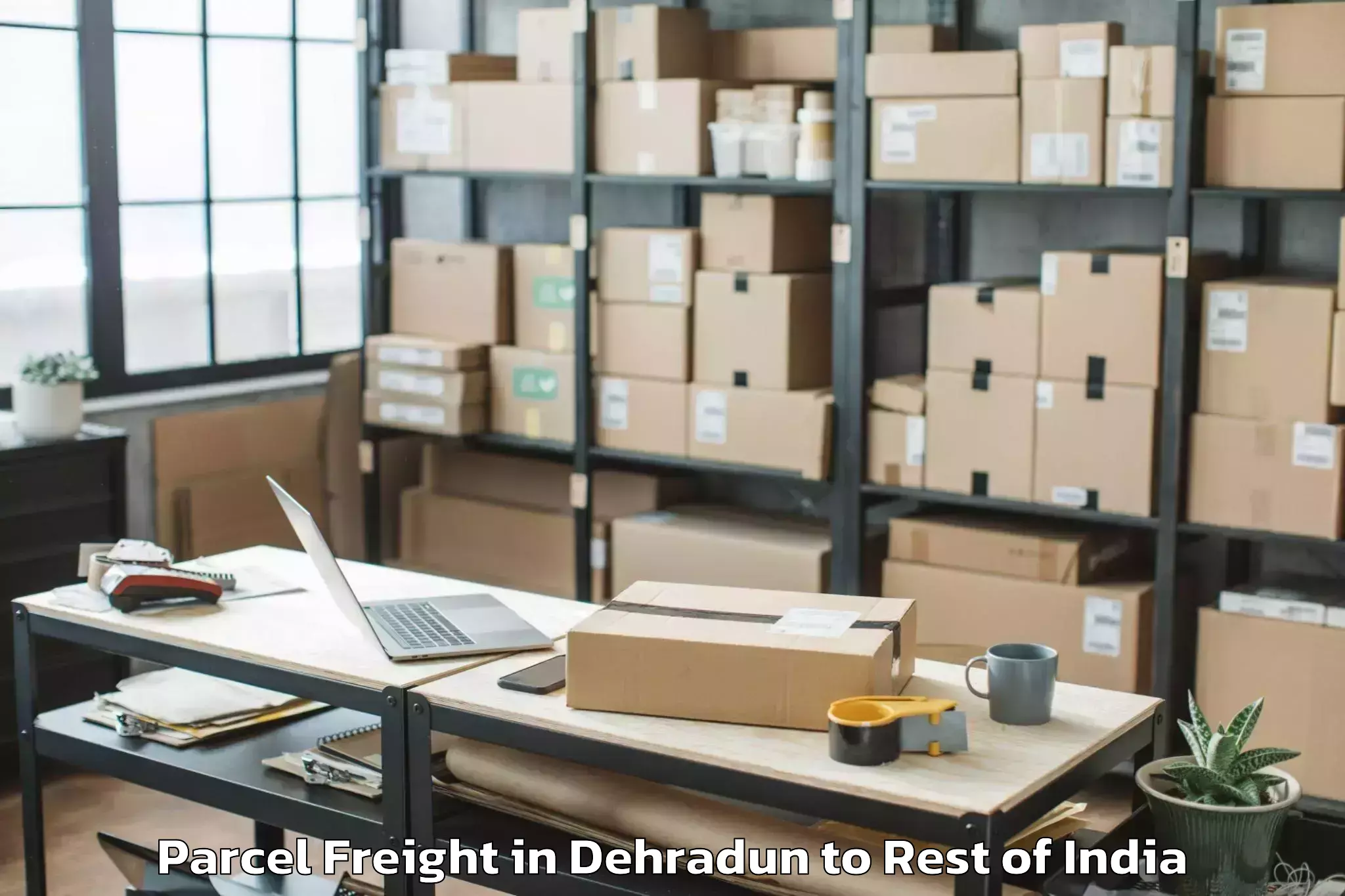 Reliable Dehradun to Kamadheni Gowraram Parcel Freight